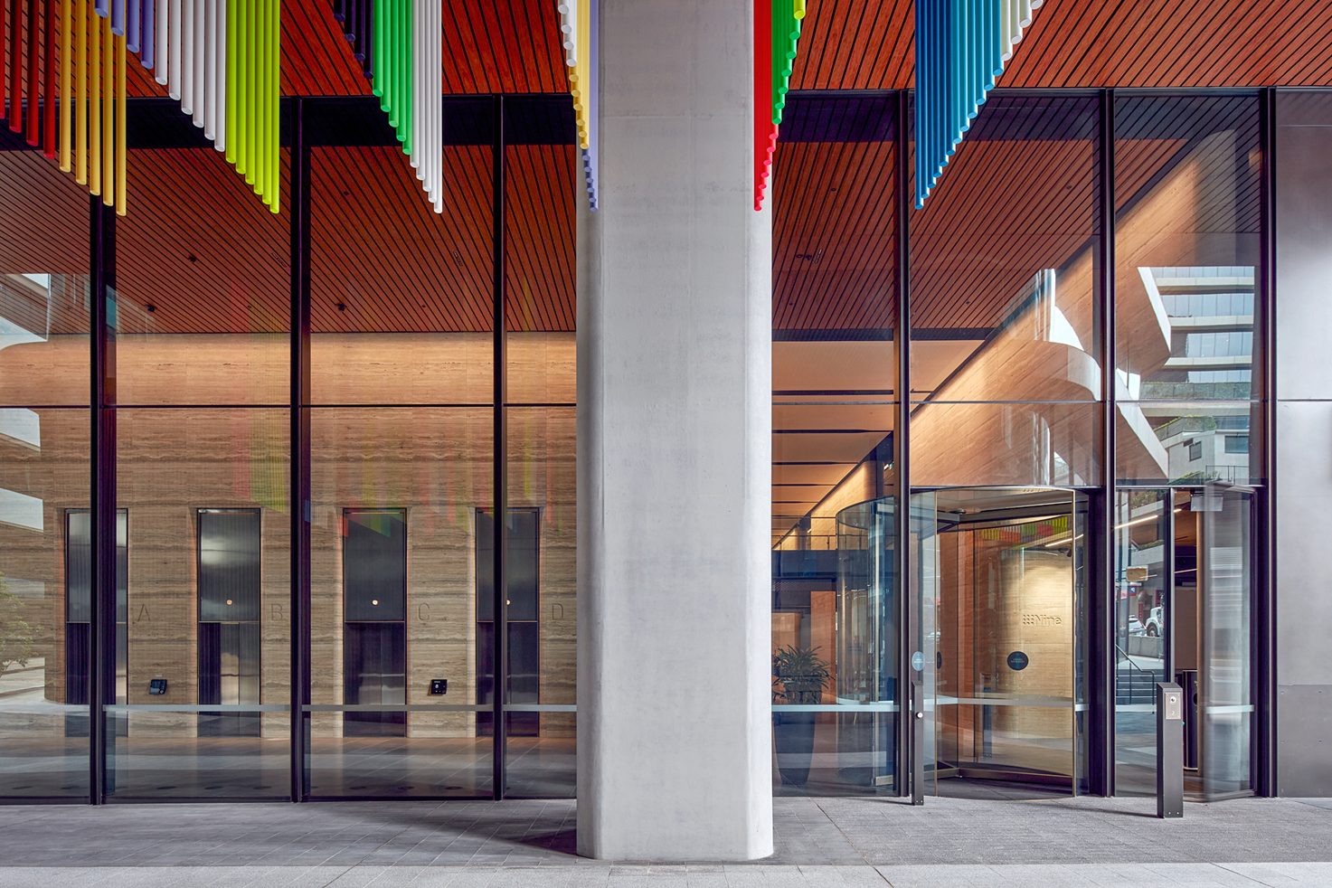 Colourful permanent artwork above the 1 Denison entrance
