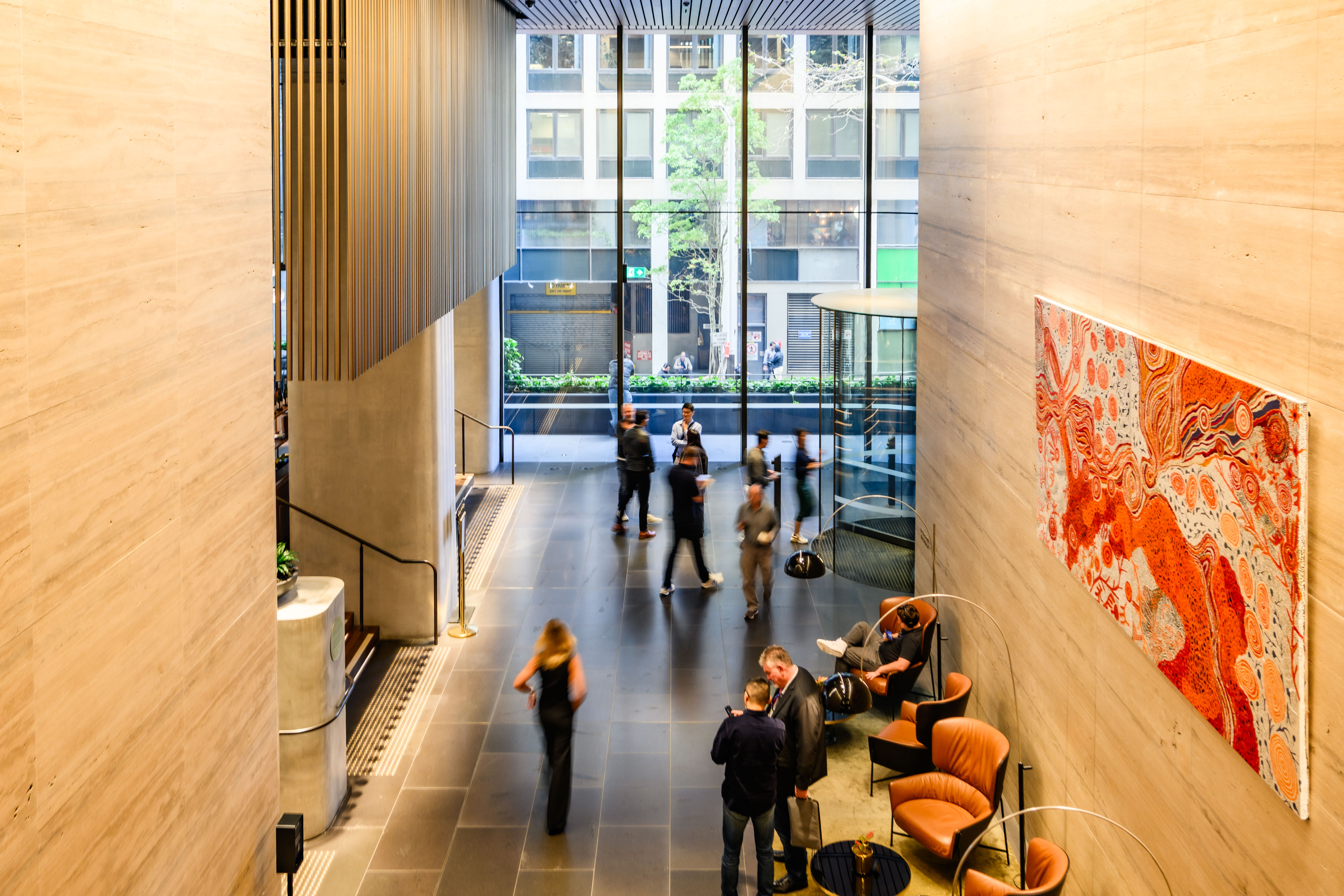 Orange lobby artwork viewed from an upper level