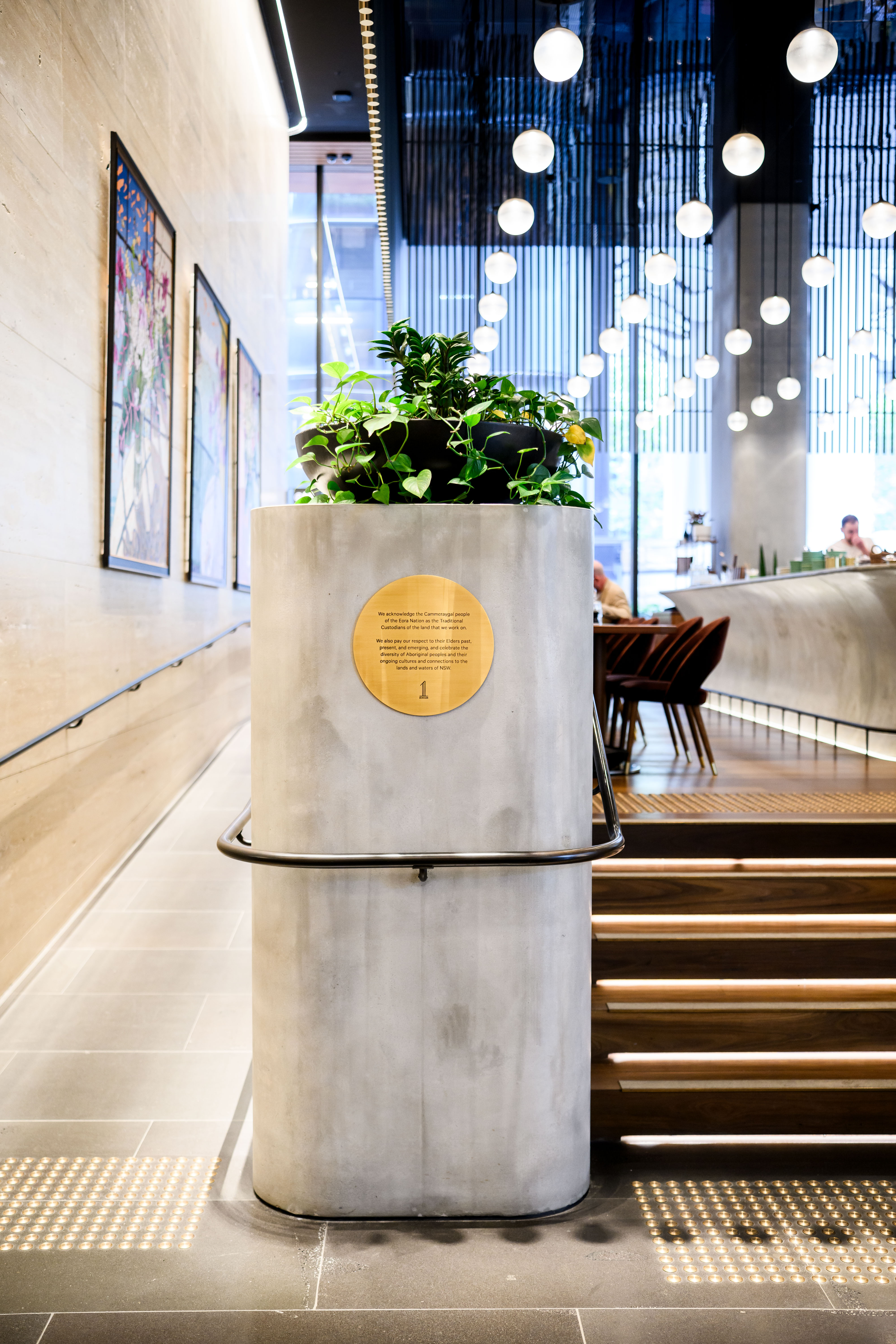 Reception desk and open workplace interior at 1 Denison