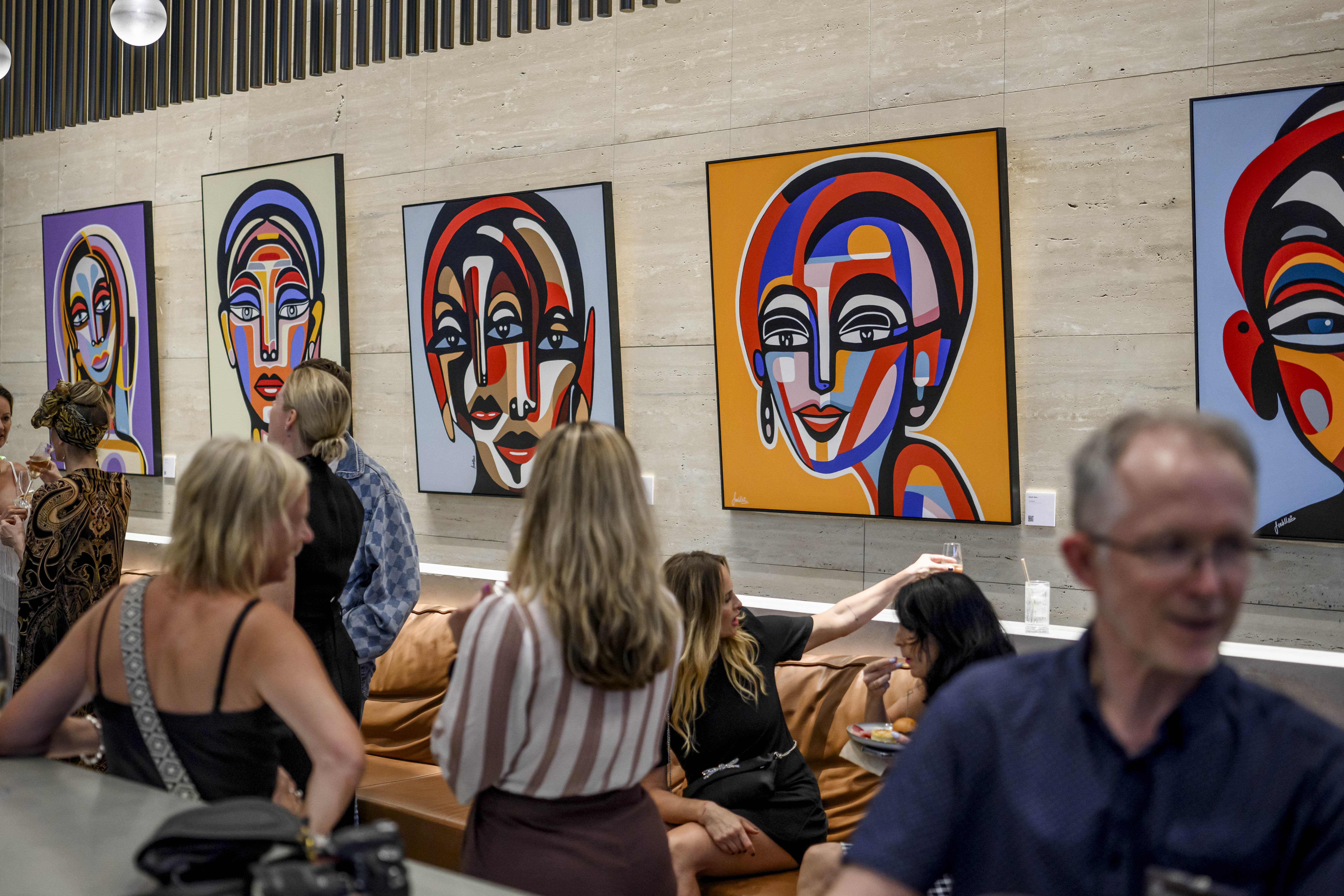 Portrait exhibition in the 1 Denison lobby